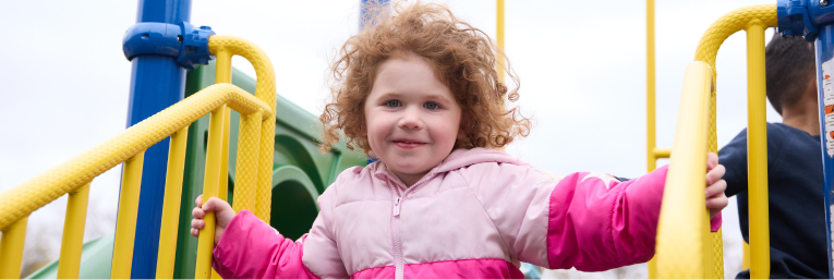 Student at Holy Name Parish School outside